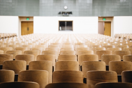 Empty seats in a university lecture hall before the GMAT. 