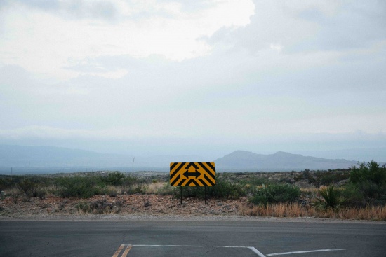 Metaphorical street sign wondering if you should retake the GMAT